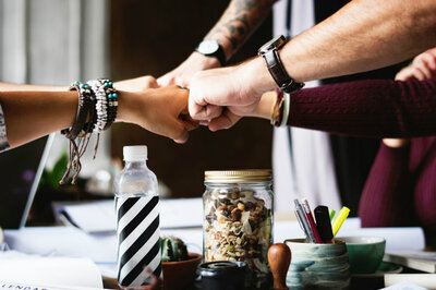 sales process coaching - fist bump