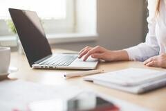 CRM implementation process - woman with computer