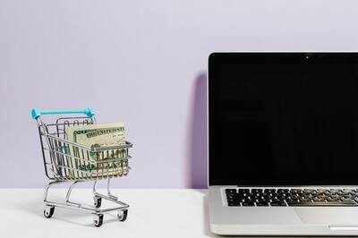 shopping cart with laptop